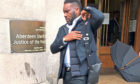 Jay-Jay Okocha leaving Aberdeen Sheriff Court