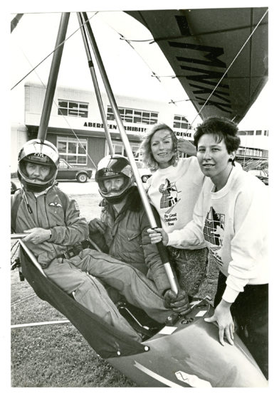 1987: Scottish Industrial and Trade Exhibition girls Suzanne Dawson (right) and Maura Ross join Microlite pair Mike Milne (left) and Stewart Grant.