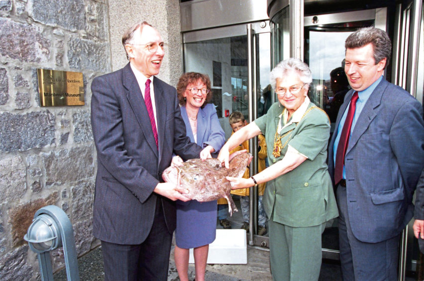 1999: Donald Dewar MSP, Lord Provost of Aberdeen Margaret Smith and a Monkfish launch the Fisheries Showcase '99 at the Maritime Museum.