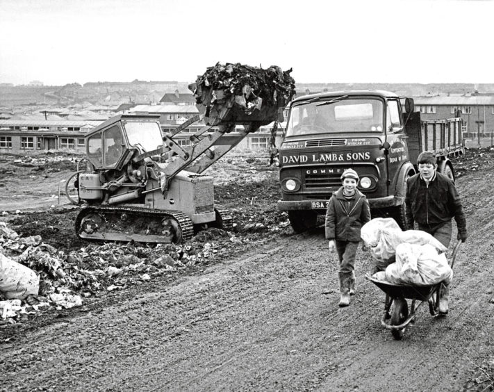 1969: The big garbage clean-up started in Aberdeen yesterday. Two boys make their way up the access road to Dancing Cairns Quarry, where private contractors cleared the rubbish.