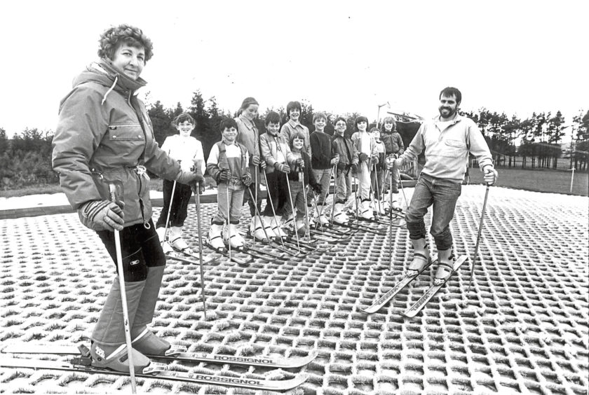 1987: Lumsden Primary School pupils pictured during their weekly skiing class at the dry ski slope in Alford. On the left is Ski instructor Nora Anderson and on the right is Mr Alistair Mackay, head teacher at Lumsden Primary School.