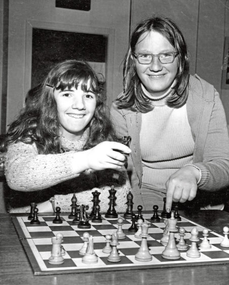 1978: North East chess fans (left) Marian Doyle (16), Inglewood, Nelson Terrace, Fife-Keith, Keith, and Shirley Skene (13), Stromboss, 93 Main Street, Tomintoul, begin a game during the chess congress at Aberdeen's Arts Centre yesterday.
