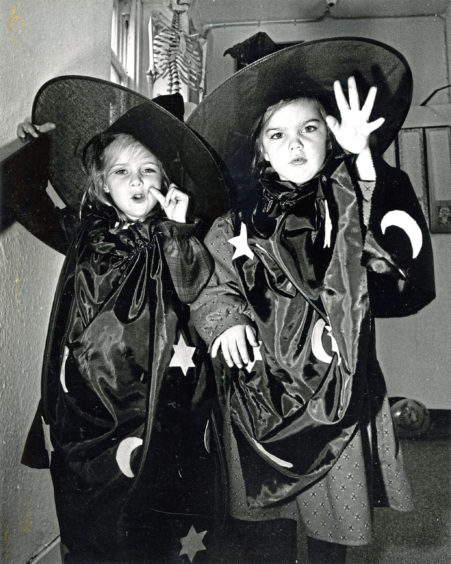 1986: All set for the Hallowe'en fun are Bieldside girls Ginny Thomson (4) and Chloe Lively (4).