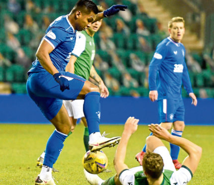 Rangers Alfredo Morelos (left) battles with Hibernian's Ryan Porteous (right) during the Ladbrokes Scottish Premiership match at Easter Road