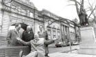1992: Another picture of the four men at the Schoolhill Pocket Park, as Mr Middleton tries one of the benches in the park.
