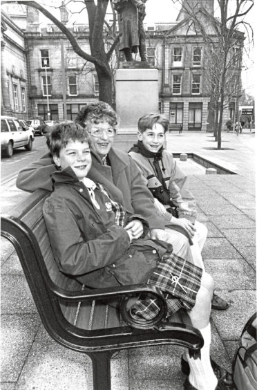 1992: Joe Stead (left) and his mum Irene with Jamie Stewart enjoy the view from one of the benches in the pocket park at Schoolhill.