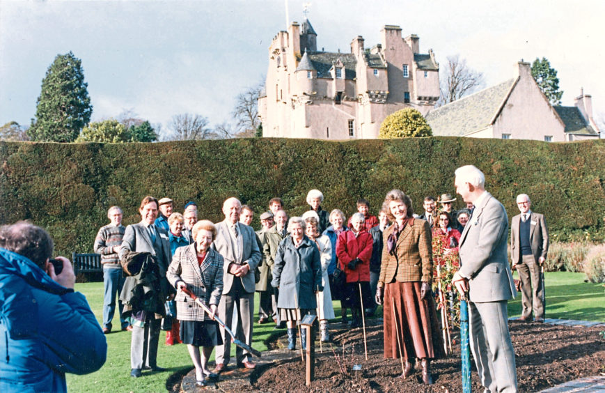 1990: Mr Alex Ramsay, Lumsden, and Mr Alex Bowman (front), Inverness, demonstrate methods of pointing a wall in Crathes Castle garden.