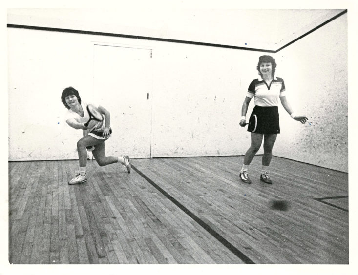 1983: The North of Scotland squash championships continued at Mannofield today. Green Final photographer Donald Stewart was there to capture the action. Pictured is Kathy Archibald (Aberdeen) makes a fine return of serve in her match against Trish Masterton (Dunfermline, right).