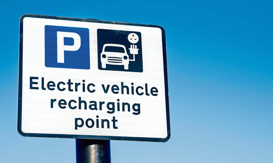 An electric vehicle charging point sign