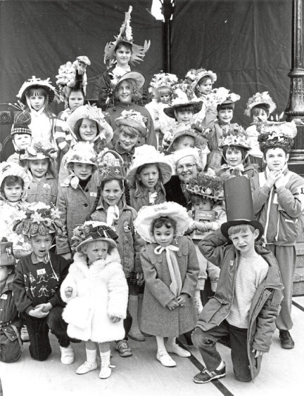 1988 - Lady provost Margaret Rae is surrounded by children who took part in the Easter Bonnet parade in St Nicholas Centre, Aberdeen, on Saturday in conjunction with this years Scottish Connection festivities. The lady Provost presented the prizes.