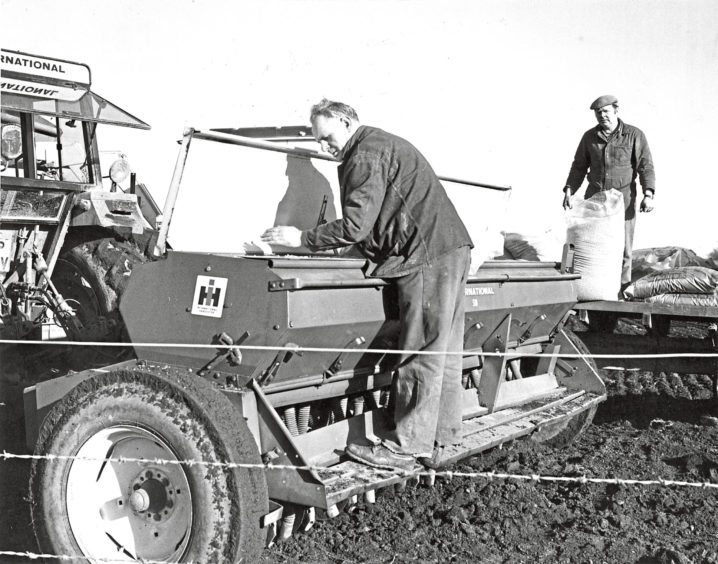 1981 - Bob Stewart and Alistair West prepare to sow a 27-acre field with barley at Mains of Kair, Fordoun
