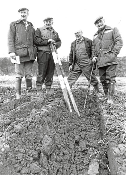 1988 - Keeping a trained eye on a ploughing contest are James Ross, Ernest McIntosh, William Watt and William Daniel
