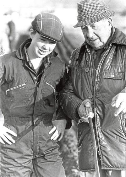 1989 - Sixteen-year-old Dianne Keith picks up tips on ploughing from old hand Harry Nicol, 93