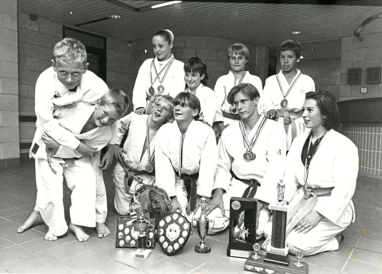 1992 - Aberdeen Judo Club members show off the 20 medals and trophies they won at the Open tournament