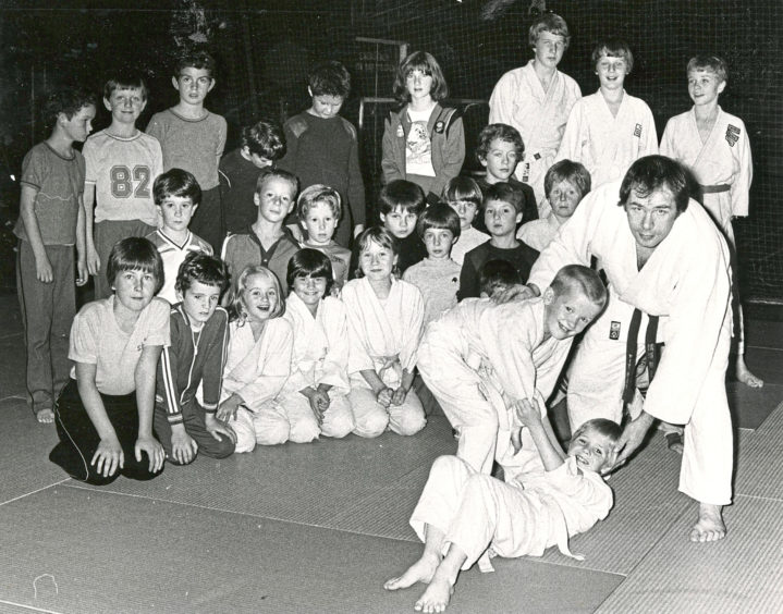 1982 - Instructor Andy McLean demonstrates a throwing technique using two pupils at the Beacon Centre