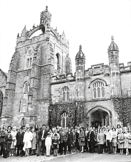 1973 - A group touring Old Aberdeen as part of Aberdeen Festival poses in front of the ‘crowned’ clock tower