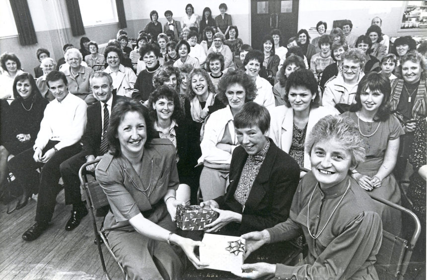 1986 - Ferryhill Players producer Betty Doig shows off the Rowntree Harvey Shield after it was presented to her by theatre critic Alistair Selway, third right