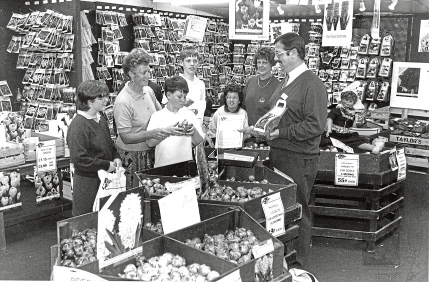 1993: Findlay Clark garden centre manager Henry Brown shows customers a selection of bulbs.