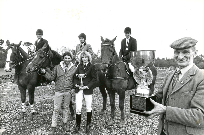 1987: Hayfield Riding Centre held their trophy show over the weekend, and showing off their silverware are winners (left to right) Joe Ronald, Aberdeen, with the Drummond Shield; Mr John Crawford, centre owner; Toots Waters, Watten, Caithness, with the Selbie Shield; Lynne Prentice, Aberdeen, with the George Mair Trophy; Mr Andrew Haig, Newtonhill, with the small medallion and winner of the Stephen Hadley Trophy, which is held by winter series judge Mr Bill Strachan.