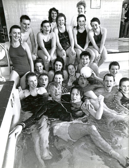 1989:  No escape for referee Alister Sinclair, in these pictures by Roy Donaldson, as Lydia Philippo (left) and Jane Anderson push him into the pool at Hazlehead Academy, Aberdeen, after the annual Lympics water polo match between the staff and pupils. The match, which was won 8-6 by the staff, gave them a 3-0 lead in the six event Lympics.