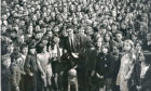 1970: Hilton Secondary School pupils with Mr J. Skinner and his dog Jasonu after a £250 cheque for the Guide Dogs for the Blind Association had been handed over by Freda Ritchie in Hilton School hall, Aberdeen, yesterday.