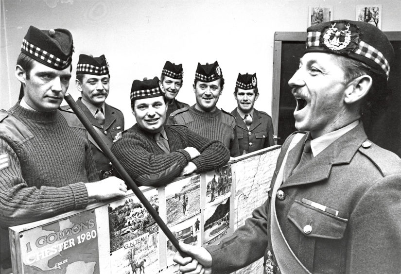 1980: Sergeant Major Lennie Lowe puts some bite into the proceedings at the Gordons Highlanders regimental study day in the Hardgate, Aberdeen.