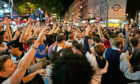 Fans react in London after England won the Euro 2020 semifinal match.