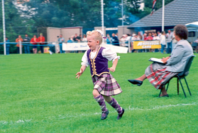 1997 - Five-year-old Samantha Leslie, of Westhill, runs to the platform in time for her dance