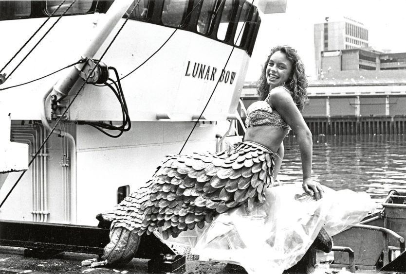 1989 - Aberdeen Fish Festival mermaid Donna Maclean surfaced  at the Neptune Quayside grading plant