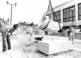 1985 - The Trumpet Leaf sculpture being lowered on to the new