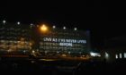 To go with story by Craig Munro. Quotes from NHS staff have been projected on the side of Aberdeen Royal Infirmary as part of a Covid art project. Picture shows; Aberdeen Royal Infirmary. Aberdeen Royal Infirmary. Supplied by Grampian Hospital Arts Trust Date; 27/02/2021