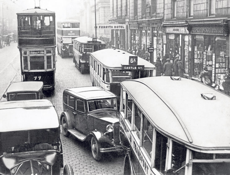 1930s: Trams, buses and cars come to a standstill in Union Street