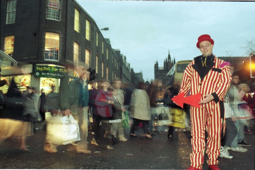 1996: Street entertainer Sean Burn, from Maverick Productions, entertains the shoppers in Aberdeen yesterday.