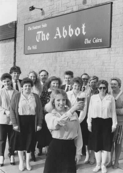 1987 - Barmaid Brenda Taylor says cheers after The Abbot in Provost Watt Drive, Kincorth, was judged the happiest Tennents pub in Scotland, winning the brewery’s Smile campaign in April 1987