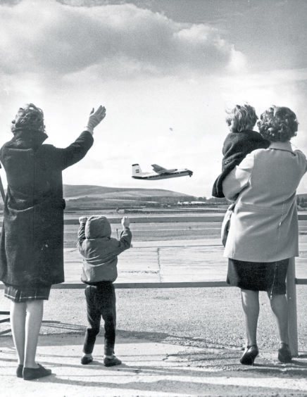 1966: These children waved off a BEA Herald as it left Aberdeen Airport for Shetland in 1966.