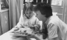 1993: Nursery nurse Helen Polsen gives patient Jacqueline Arbuthnott, Torphins, some help with her designs in fuzzy felt at Royal Aberdeen Children's Hospital.