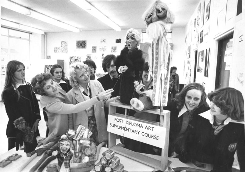 1978: Aberdeen College of Education art department member Mrs Annette Thomson points out some puppets to Kathleen Duguid