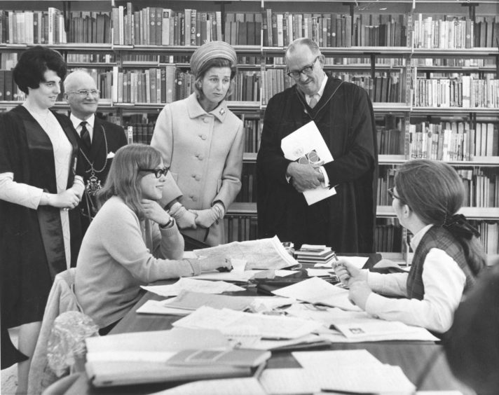 1969: In the library the Princess Alexandra chats with Beverley Rae and Mary Brown who were busy at prep.