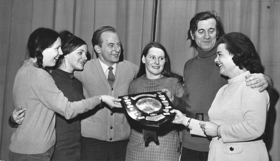 1971: The winning Aberdeen College of Education A team receive the George Rowntree Harvey Trophy from Mrs K. J. Peters, wife of the managing director of Aberdeen Journals Ltd., after their success at the Arts Centre last night.
