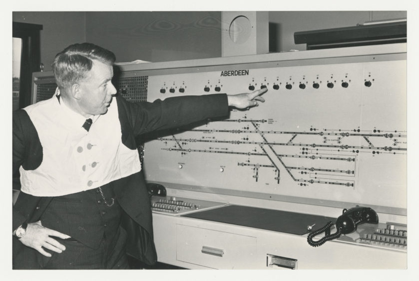 1981: Aberdeen area operations manager John Gough tests out some equipment at the new signalling centre at Aberdeen Railway Station.