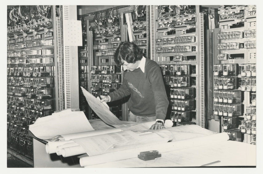 1981: Inside the new signalling centre at Aberdeen Station, Douglas Kikr works on the electrical relays for the new box