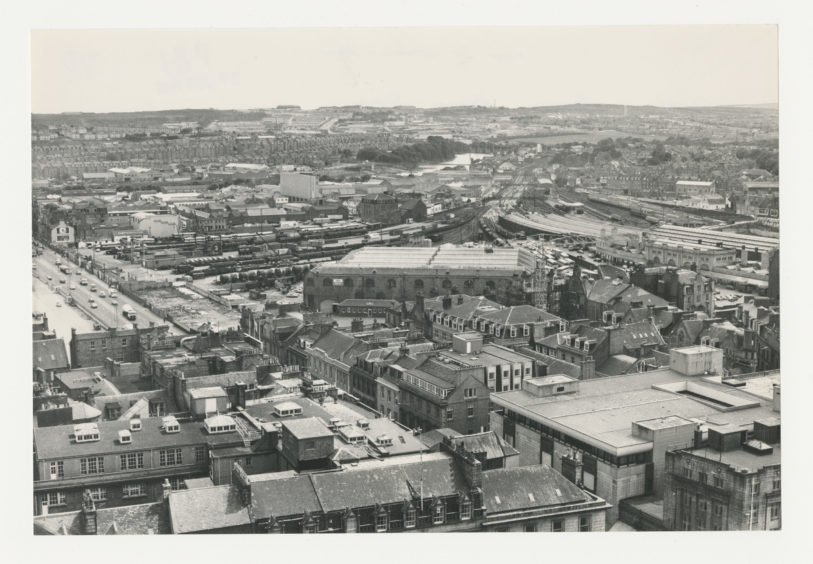 1981: Aberdeen Railway Station (centre right) as viewed from St Nicolas House municipal with South Market Street on the left of the image.