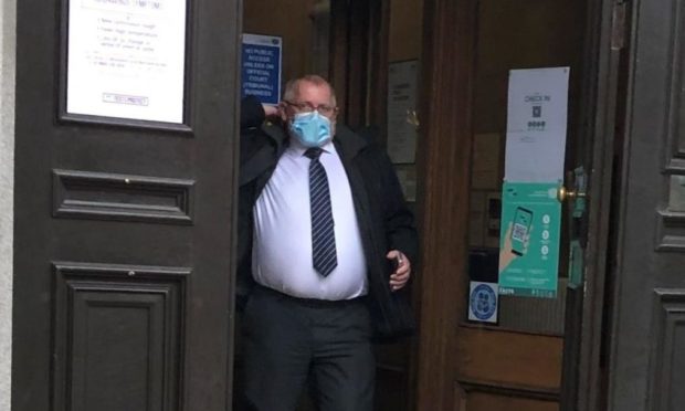 Andrew Thomson leaving court.