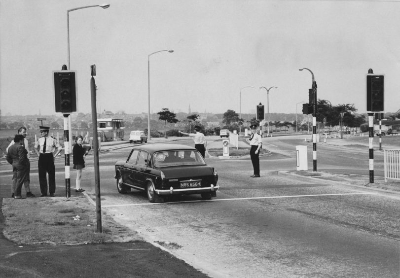 1971: Police were out in force at the Bridge of Dee, Aberdeen, yesterday afternoon when the new traffic lights were in operation for the first time.