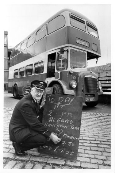 1983: Inspector George Reid with the smart old double-decker used for trips to Alford Transport Museum.