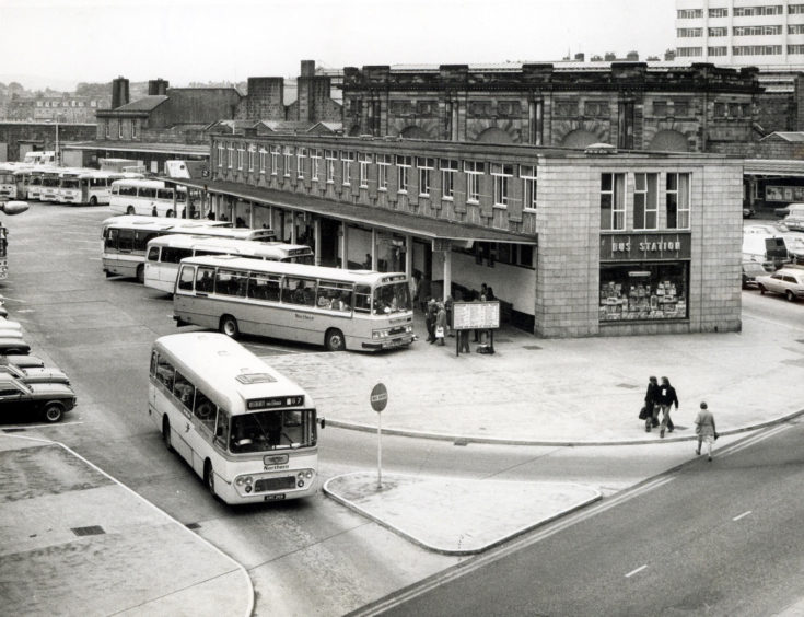 1977: : The busy scene at the bus station on Guild Street as a single-decker takes to the road.