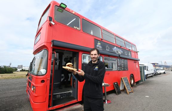 Samuel Georgescu pictured with the soon-to-be-open Bonnie Bus.
