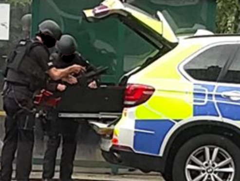 Armed police at the scene on Holburn Street this afternoon.