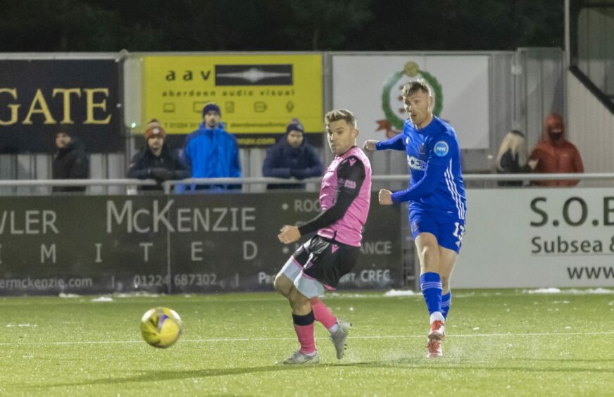 Rory McAllister fires in a late equaliser for Cove