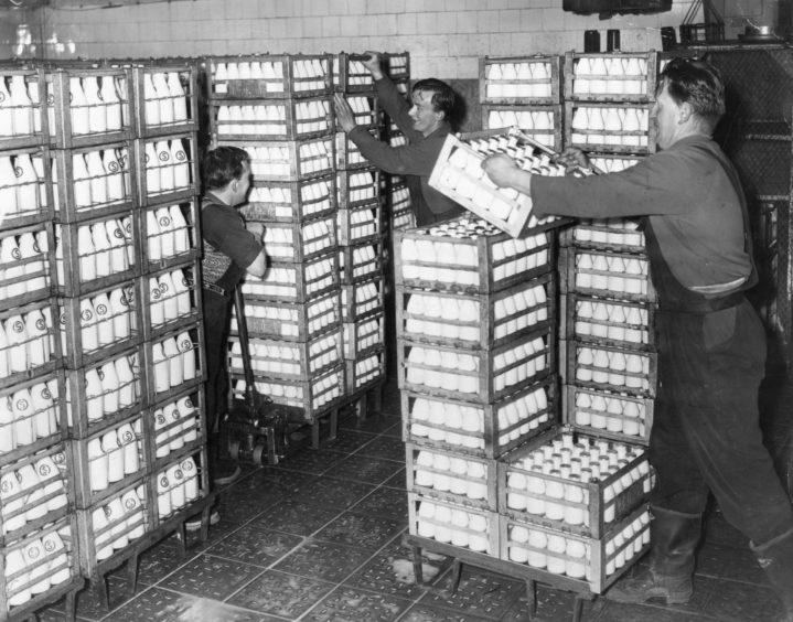1961: Northern Co-operative Society dairy - Storing the filled bottles in the fridge.